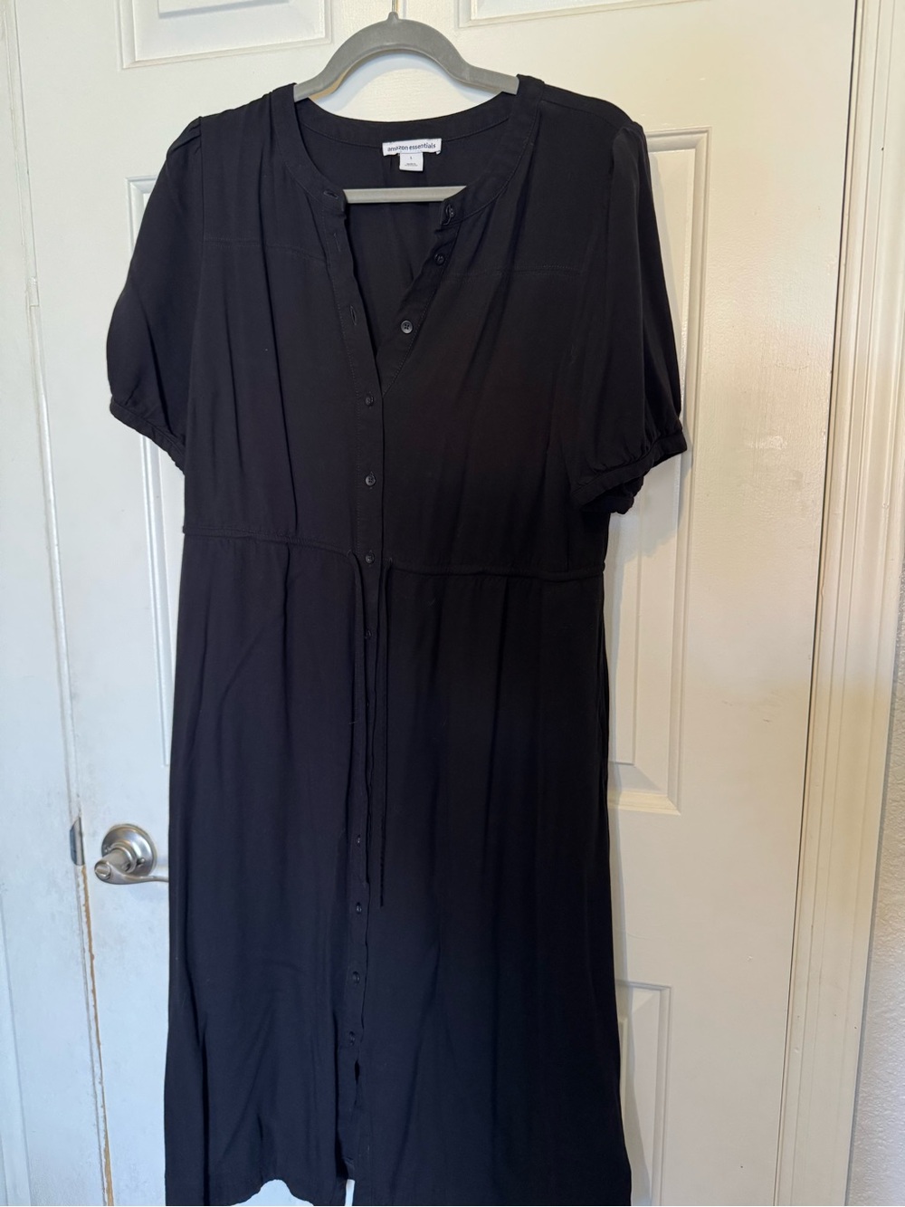 Women’s black short sleeve button down tie waist dress